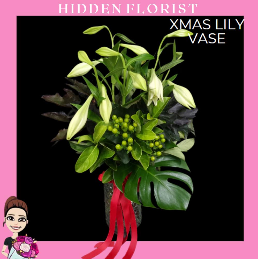 Xmas Lily Vase, Hidden Florist, Sunbury, Victoria. Sunbury`s Florist. Gisborne Florist. Woodend Florist. Macedon Florist. Kyneton Florist. Romsey Florist. Lancefield Florist. Diggers Rest Florist.